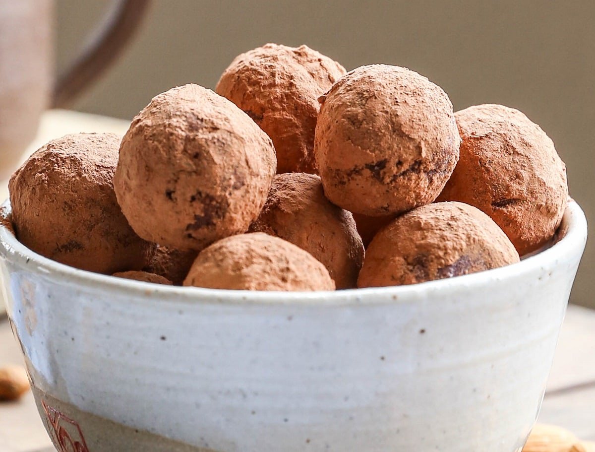 horizontal image of bowl of chocolate energy bites