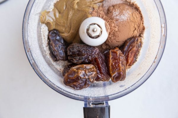 all of the ingredients for the energy bites in a food processor