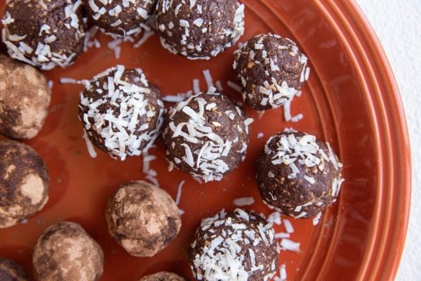 plate of rolled peanut butter energy balls