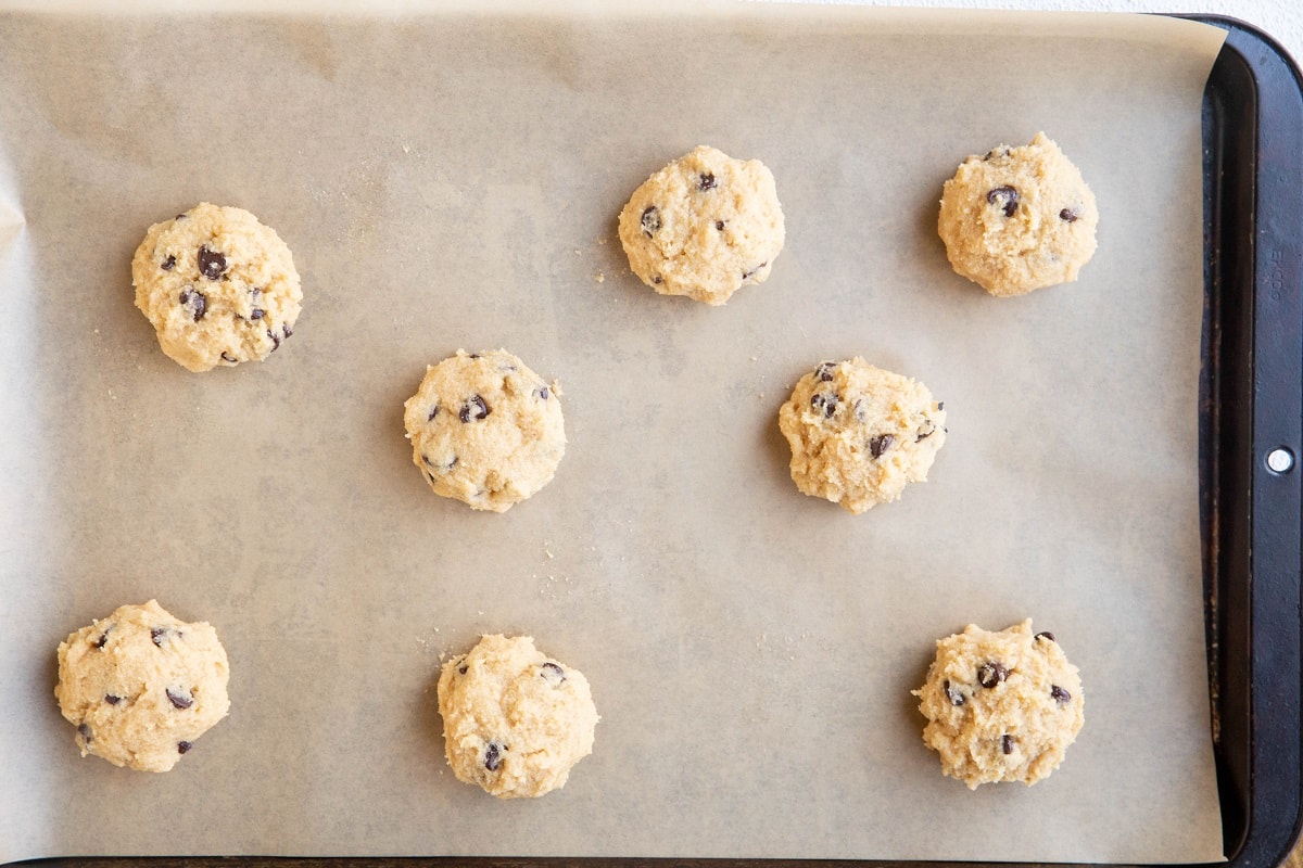 Mounds of dough on a baking sheet