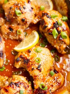 Honey Lemon Garlic Baked Chicken Thighs in a casserole dish