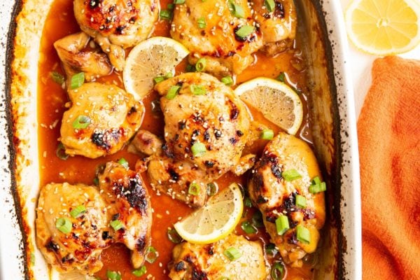 casserole dish with baked chicken fresh out of the oven