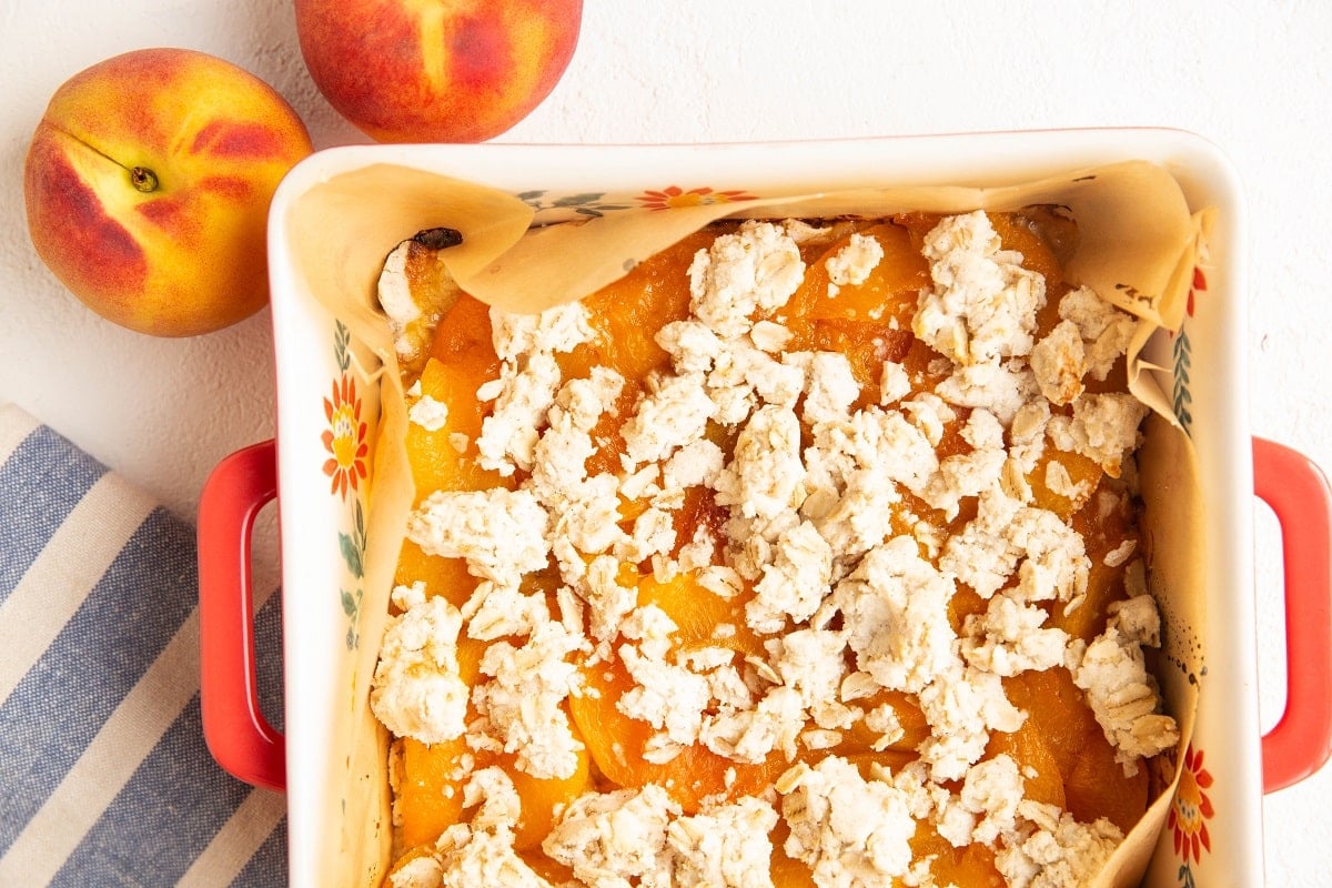 Peach Pie Oatmeal Bars fresh out of the oven in a baking pan