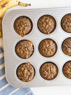 Muffin tin with banana baked oatmeal muffins