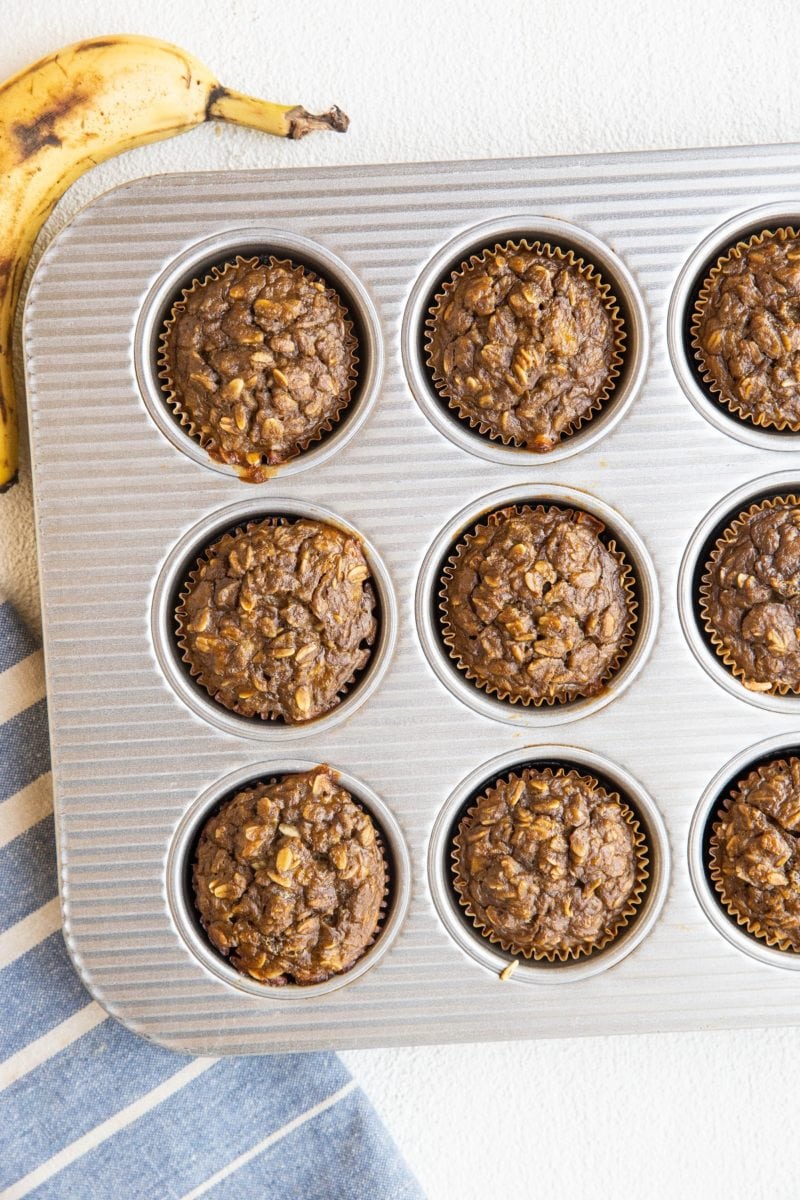 Muffin tin with banana baked oatmeal muffins