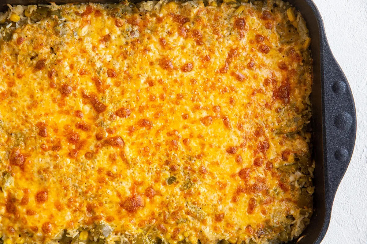 Chicken casserole out of the oven with cheese on top.