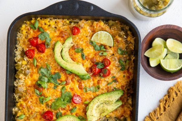 horizontal photo of casserole dish of mexican green salsa chicken casserole