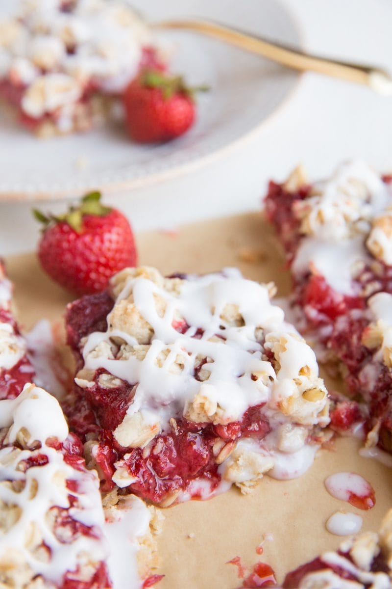 close up shot of a gooey strawberry crumb bar