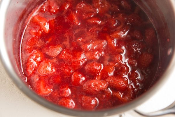 Strawberry jam filling in a saucepan