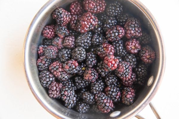 fresh blackberries in a saucepan