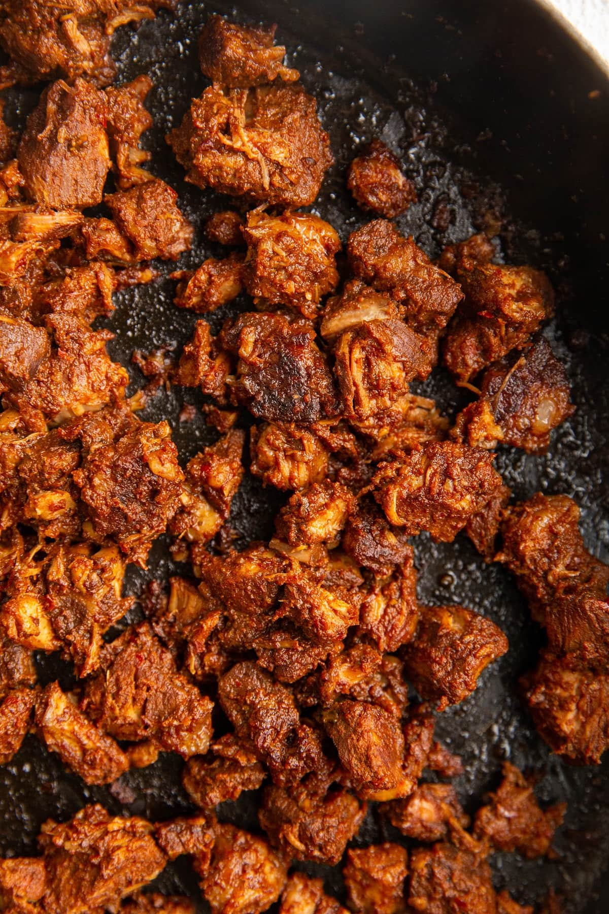 crispy al pastor in a cast iron skillet