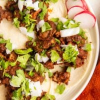 Plate of al pastor tacos