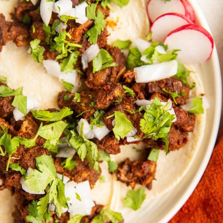 Plate of al pastor tacos