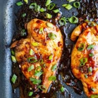 Asian chicken breasts in a casserole dish