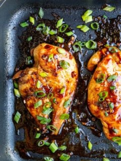 Asian chicken breasts in a casserole dish