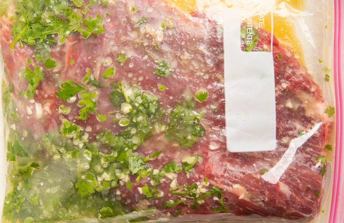 meat marinating in a plastic bag