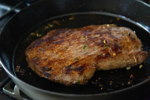 Carne asada in a skillet