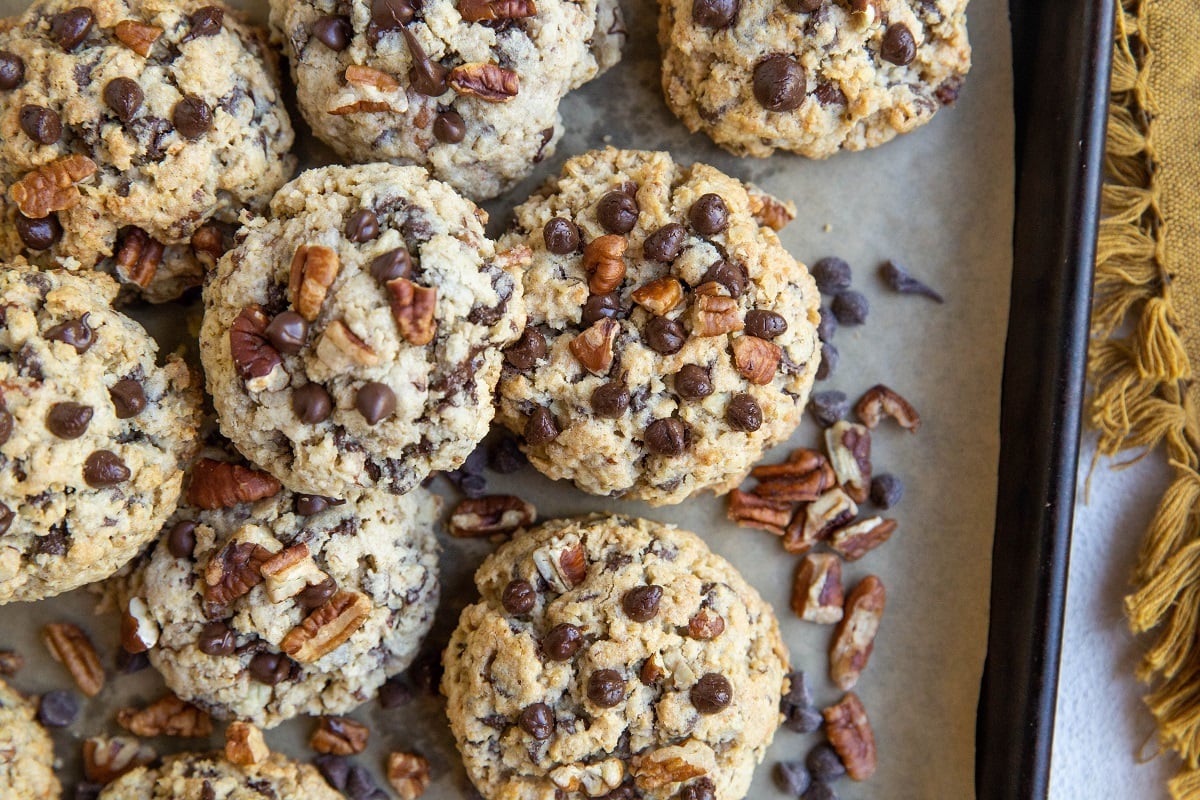 horizontal photo of a baking sheet of cowboy cookies