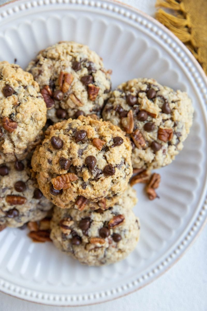 white plate of gluten free chocolate chip cookies with oats