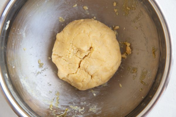 Ball of biscuit dough in a mixing bowl