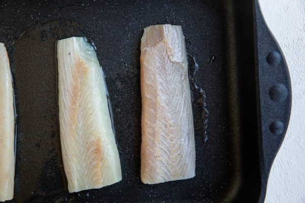 Cod fillets in a casserole dish