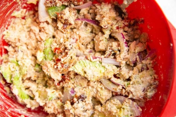 mixing bowl of finished salmon salad mixed up