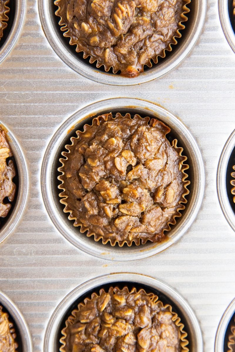Top down photo of baked oatmeal muffins in a muffin tray