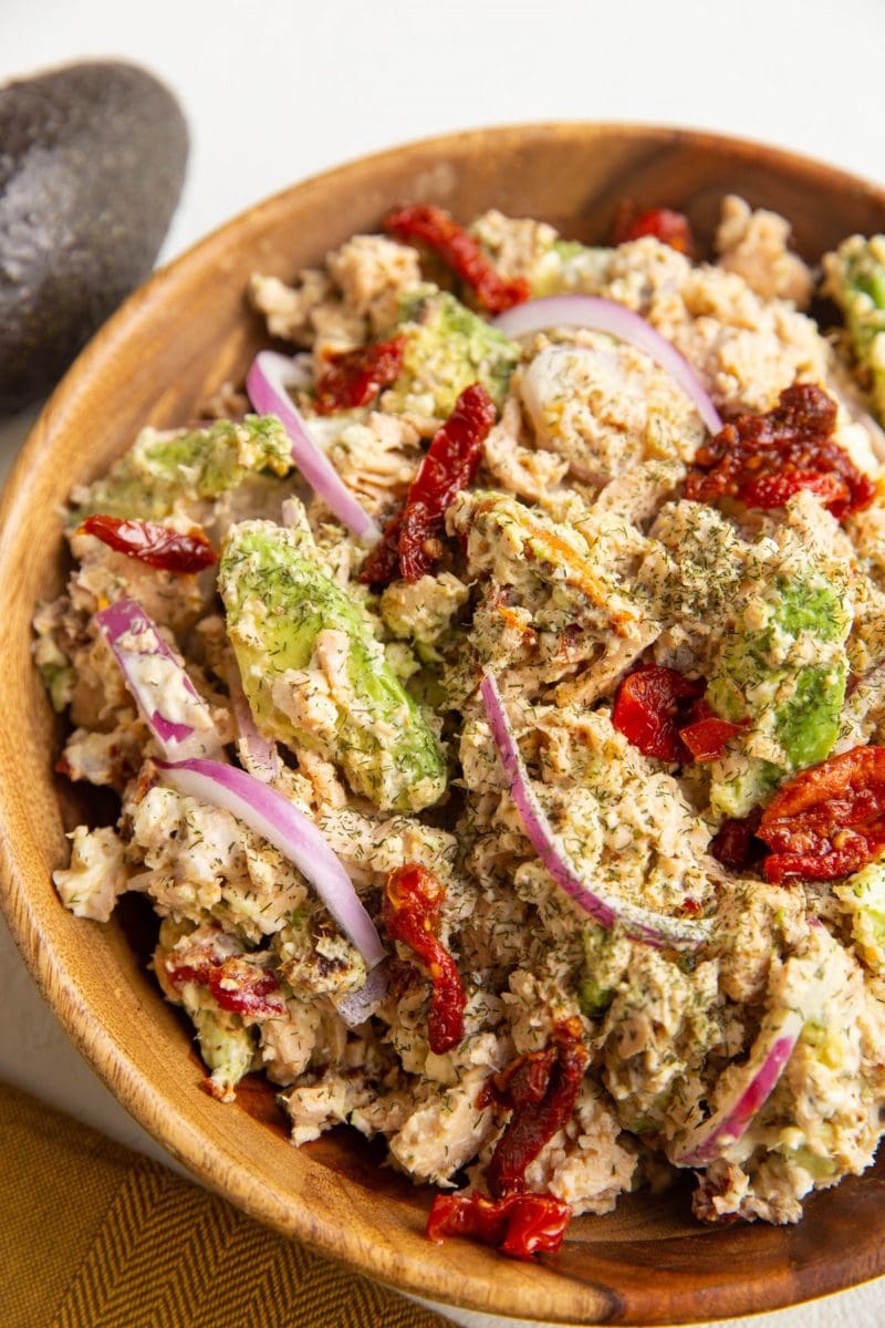 Wooden bowl of Mediterranean salmon salad