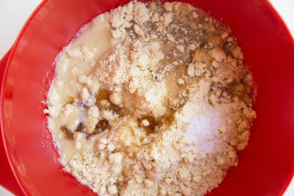 Ingredients for cake batter in a mixing bowl.