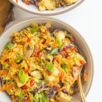 close up two bowls of Thai zucchini and chicken