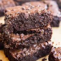 close up image of a stack of almond flour brownies