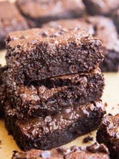 close up image of a stack of almond flour brownies