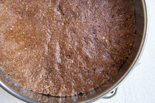 Crust mixture pressed into the bottom of a pie pan