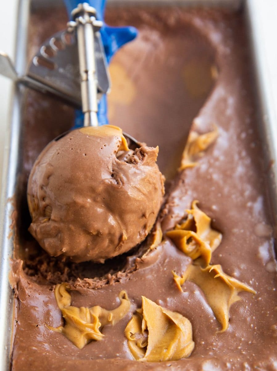 homemade ice cream being scooped in an ice cream scooper.