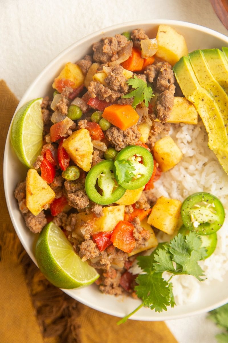 Close up top down photo of picadillo with white rice