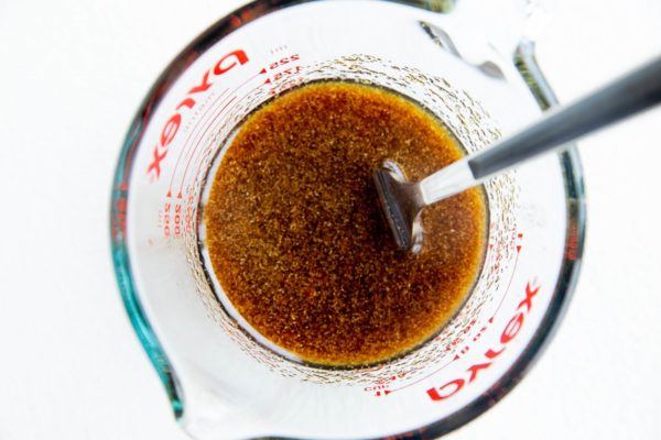 ingredients for the marinade in a measuring cup