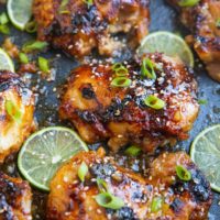 photo of honey lime chicken thighs all sticky and delicious in a casserole dish