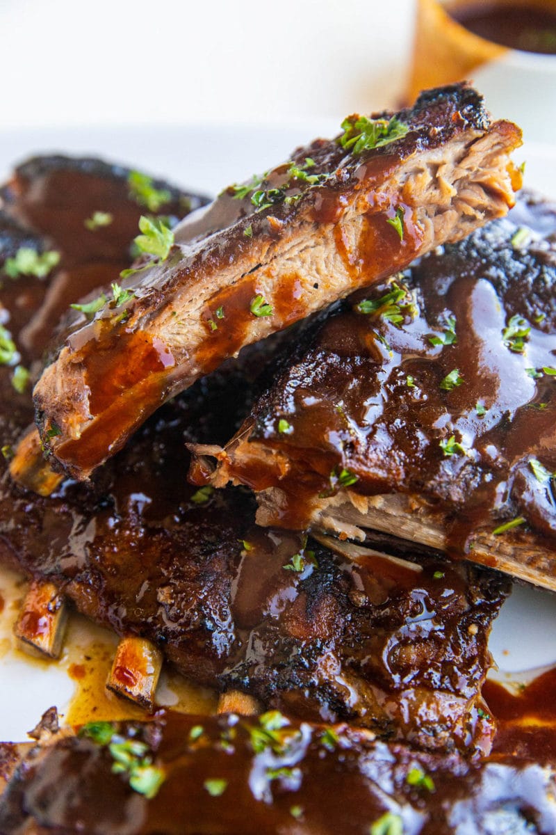 Stack of barbecue baked ribs on a platter