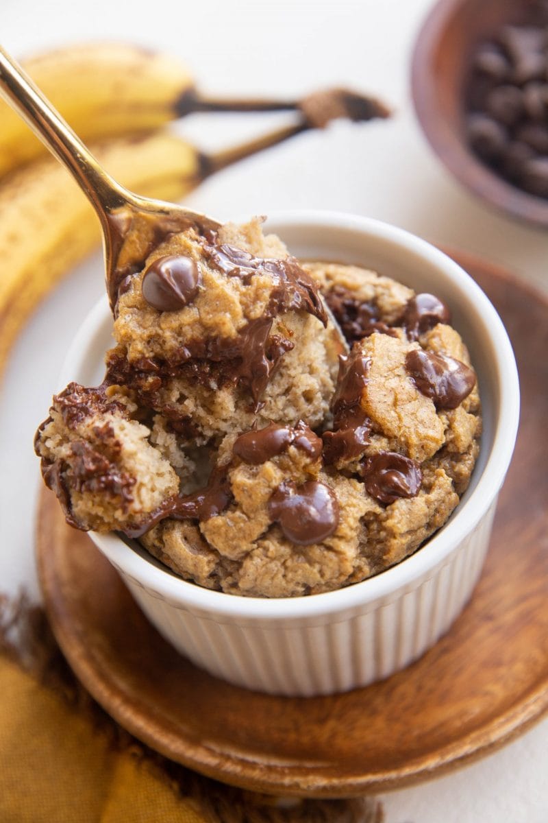 Spoon digging out a bite of chocolate chip banana blended oatmeal.