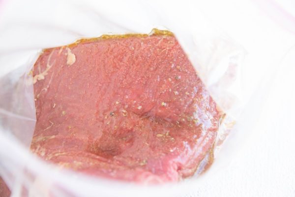 Steak in a zip lock bag with skirt steak marinade