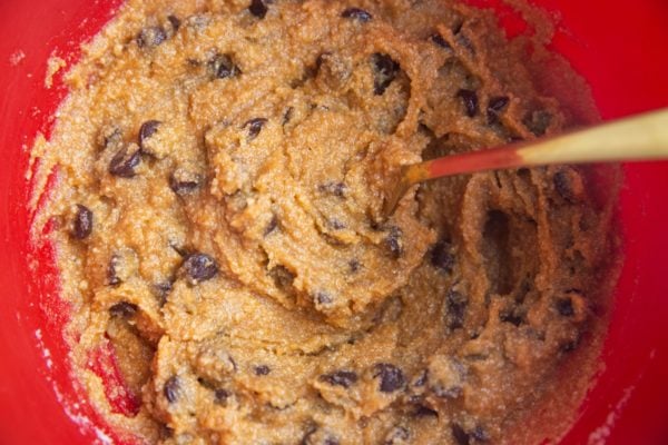 Chocolate chip paleo pumpkin blondie dough in a mixing bowl.