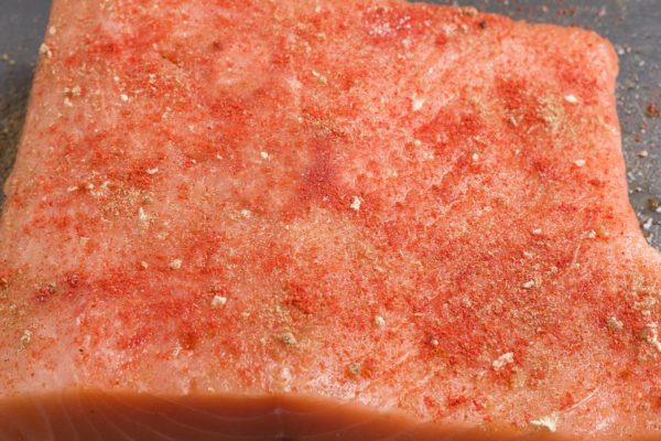 Seasoned salmon ready to go into the oven.