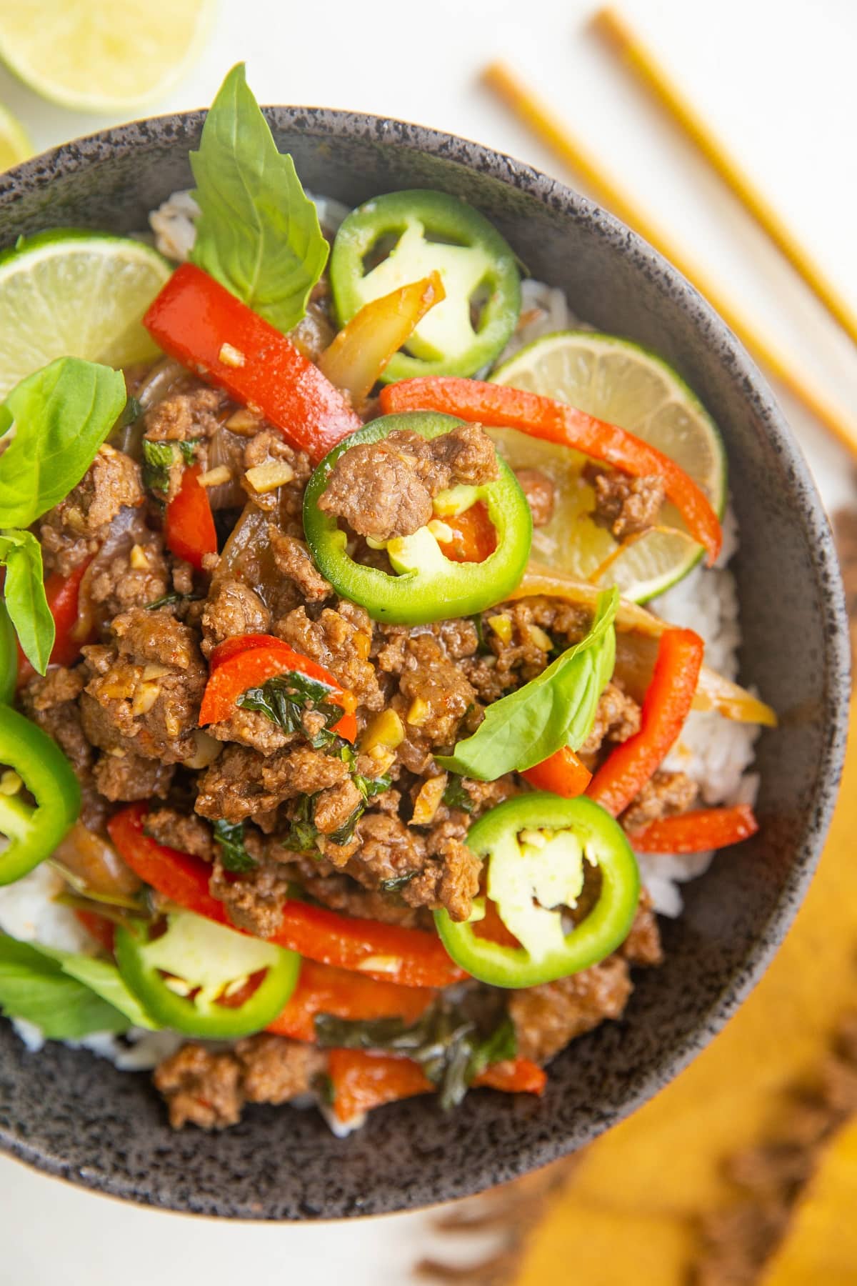 Healthy 30-Minute Thai Basil Beef (Pad Gra Prow) is savory, sweet, with just the right amount of kick. Easy to prepare any night of the week for a healthy easy dinner recipe! Gluten-free, soy-free, refined sugar-free, whole30 and paleo.