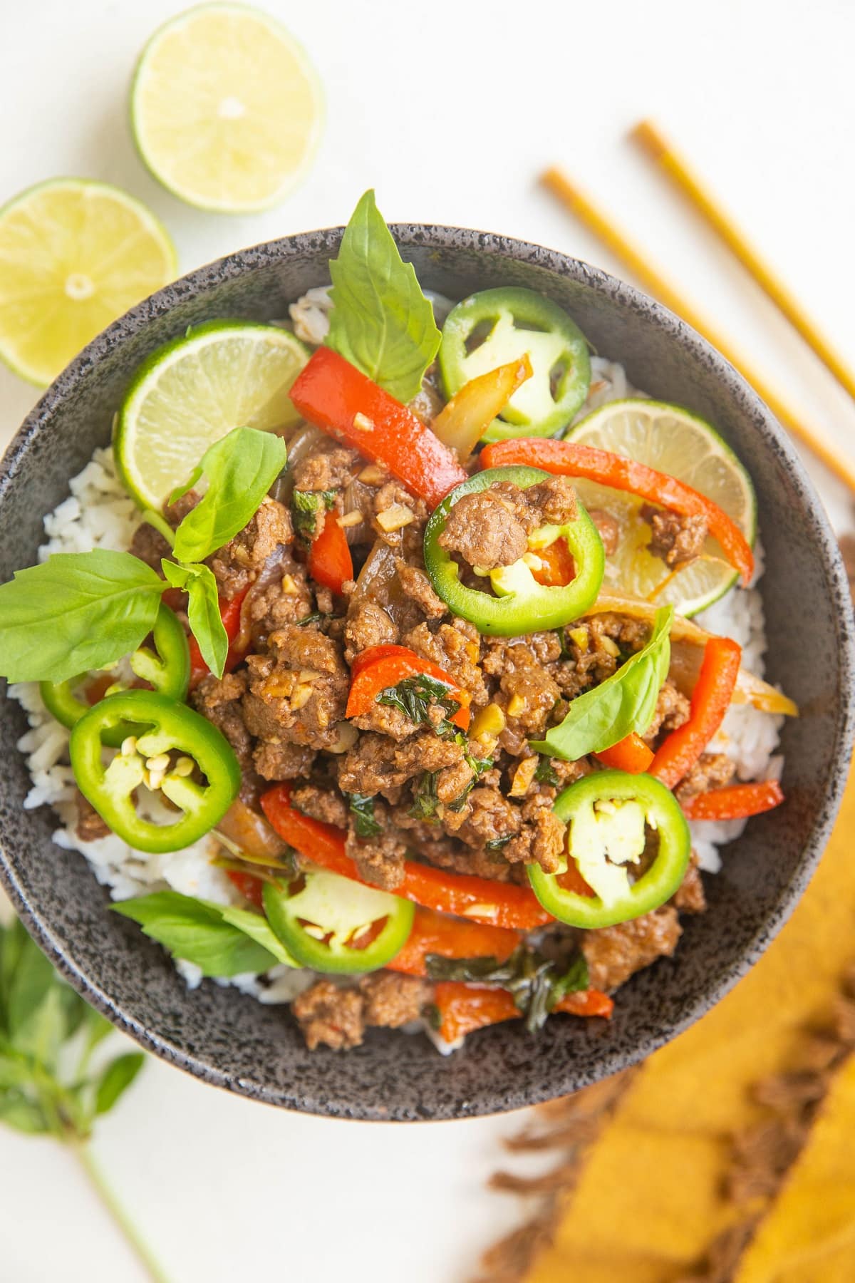 Healthy 30-Minute Thai Basil Beef (Pad Gra Prow) is savory, sweet, with just the right amount of kick. Easy to prepare any night of the week for a healthy dinner! Gluten-free, soy-free, refined sugar-free and paleo.