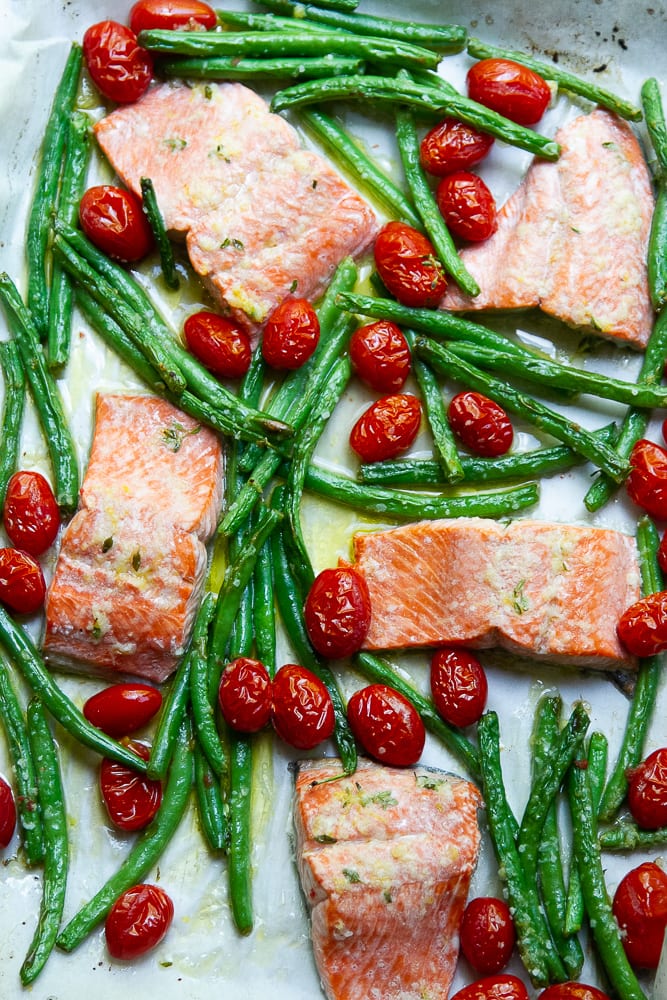 Garlic Butter Salmon on a sheet pan with green beans and tomatoes