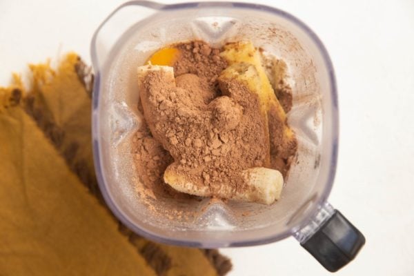 Ingredients for chocolate banana bread in a blender