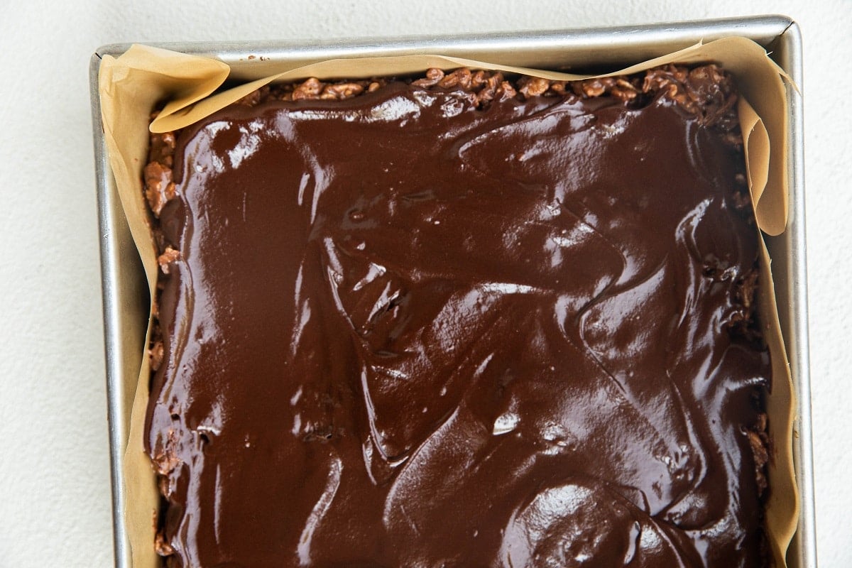 Finished chocolate peanut butter rice kripies in a baking pan, ready to go into the freezer.