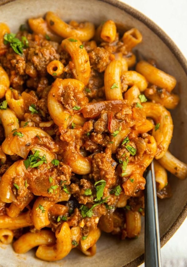 Big bowl of gluten-free dairy-free Hamburger Helper with a fork.