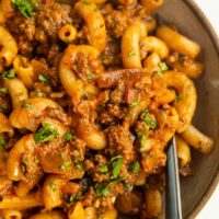 Big bowl of gluten-free dairy-free Hamburger Helper with a fork.