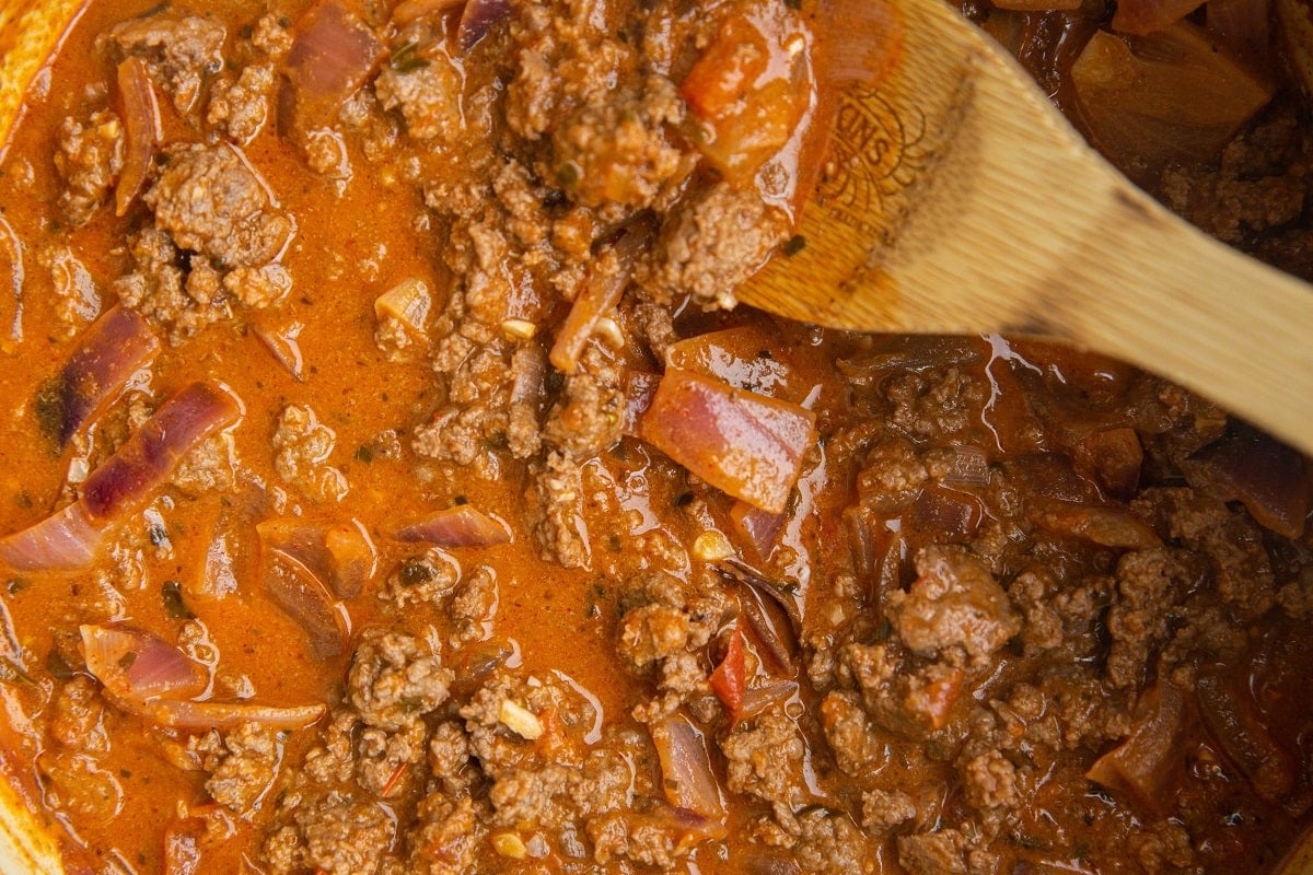 The complete hamburger helper sauce in a pot.